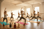 groups-of-people-practicing-yoga-with-smoothies-around-them